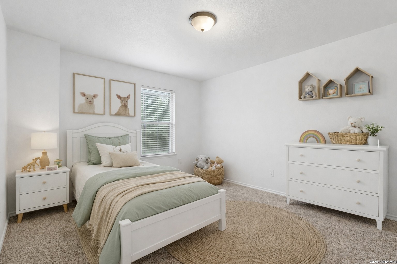 9819 Hawk Shore Converse, TX 78109 - Photo 17 of 26 a bedroom with a bed and a window