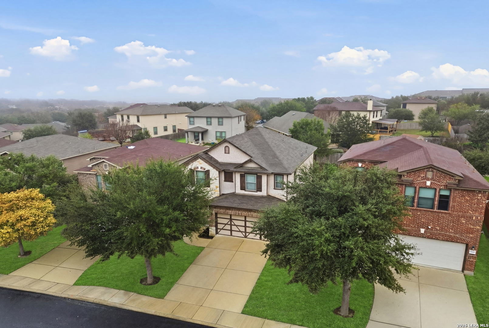 9819 Hawk Shore Converse, TX 78109 - Photo 25 of 26 an aerial view of multiple house