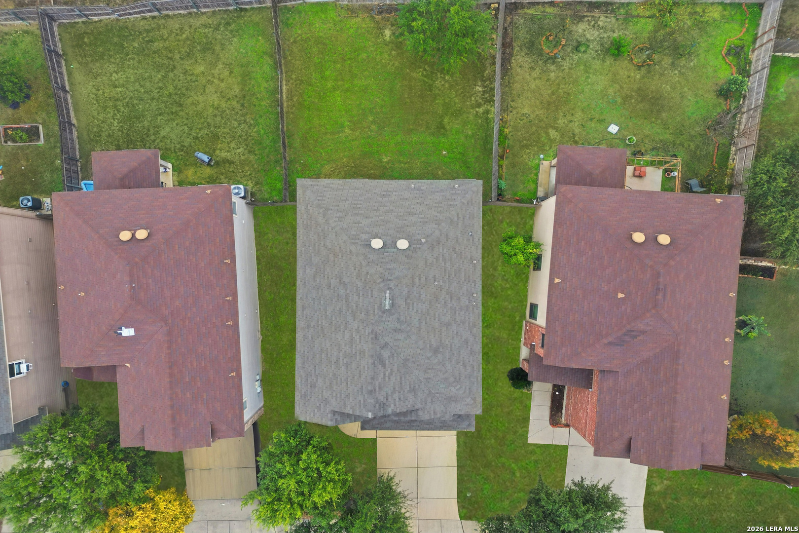 9819 Hawk Shore Converse, TX 78109 - Photo 26 of 26 an aerial view of a house with a yard and a fountain