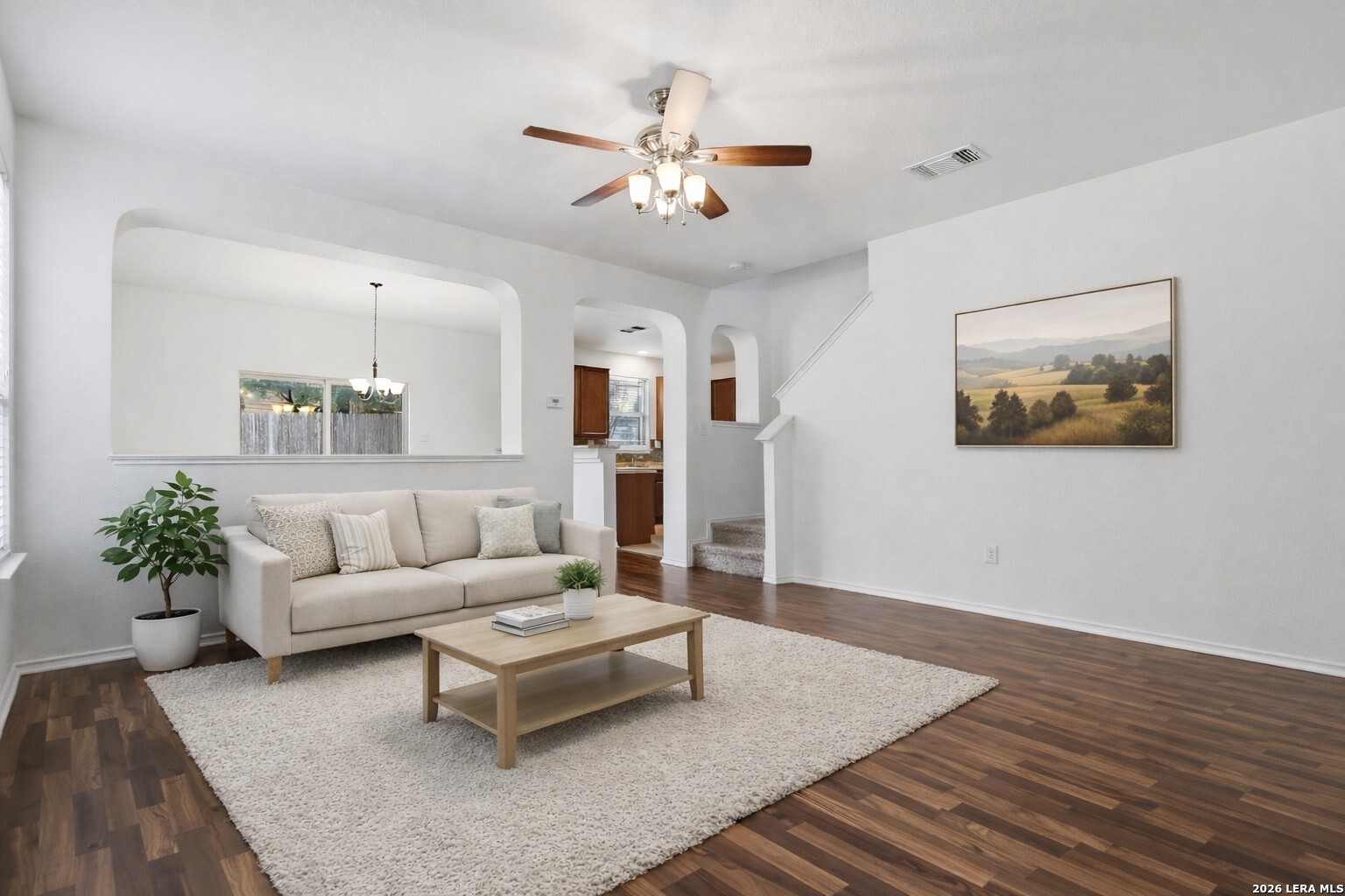 9819 Hawk Shore Converse, TX 78109 - Photo 3 of 26 a living room with furniture and a chandelier