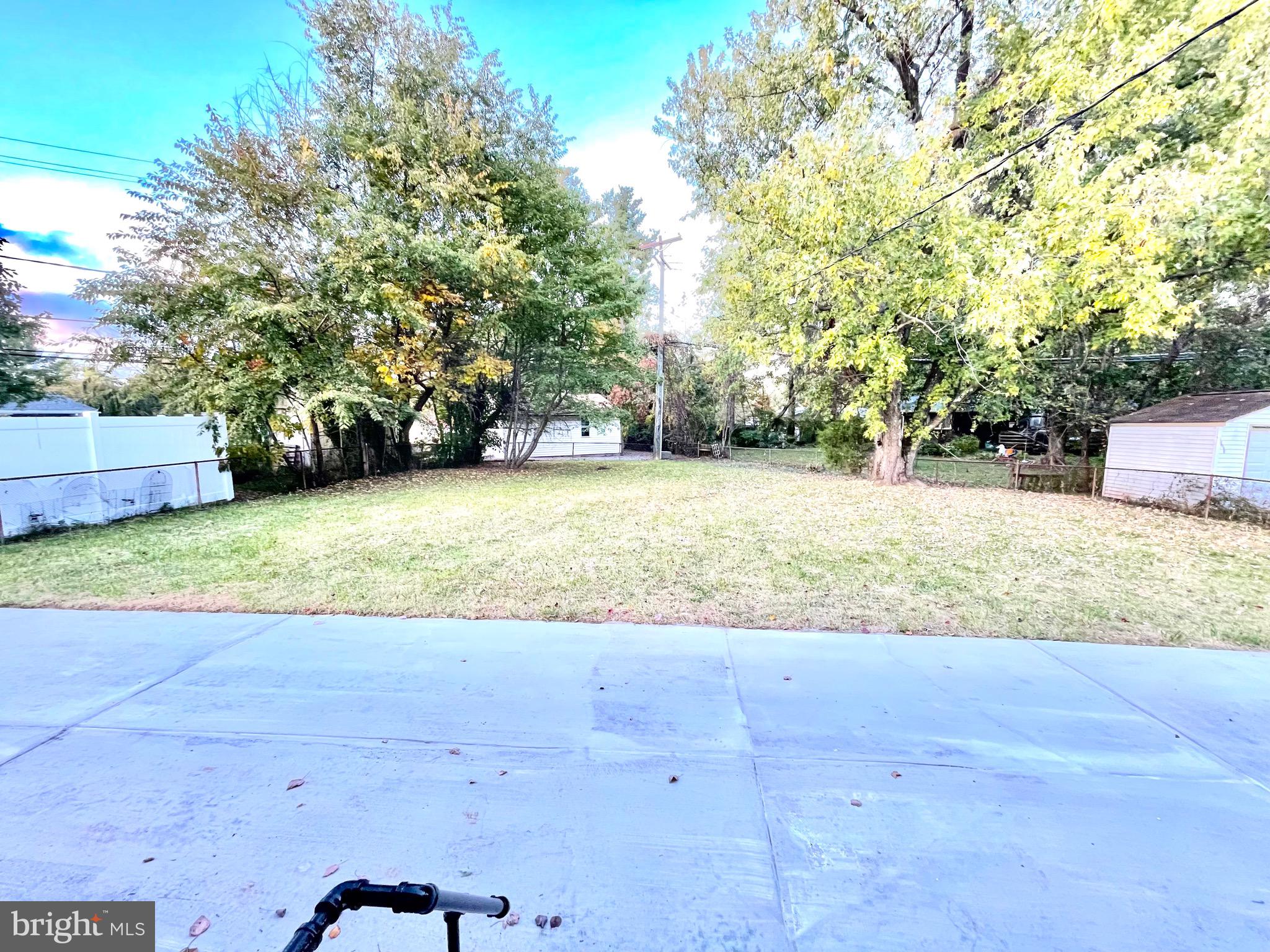 9712 Liberty Road Randallstown, MD 21133 - Photo 30 of 32 Spacious back yard with a concrete patio