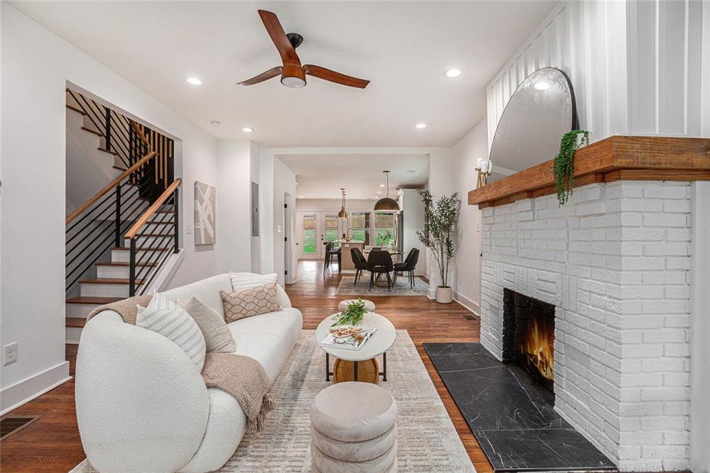 1721 South Gordon Street Southwest Atlanta, GA 30310 - Photo 11 of 44 a living room with furniture and a fireplace