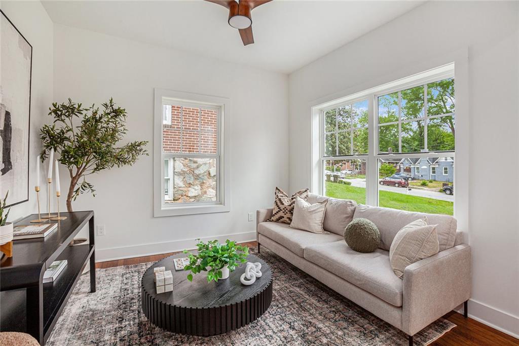 1721 South Gordon Street Southwest Atlanta, GA 30310 - Photo 12 of 44 a living room with furniture and a potted plant