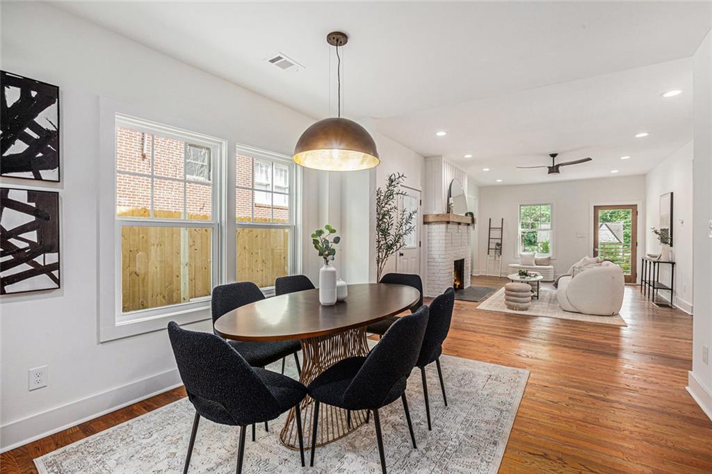 1721 South Gordon Street Southwest Atlanta, GA 30310 - Photo 13 of 44 a view of a dining room with furniture window and wooden floor