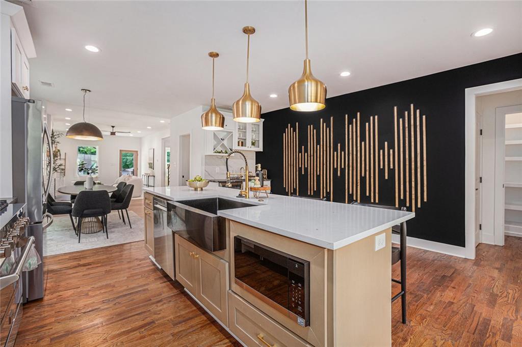 1721 South Gordon Street Southwest Atlanta, GA 30310 - Photo 17 of 44 a kitchen that has a lot of cabinets in it