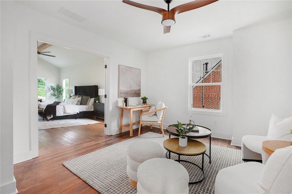 1721 South Gordon Street Southwest Atlanta, GA 30310 - Photo 22 of 44 a living room with furniture and a wooden floor
