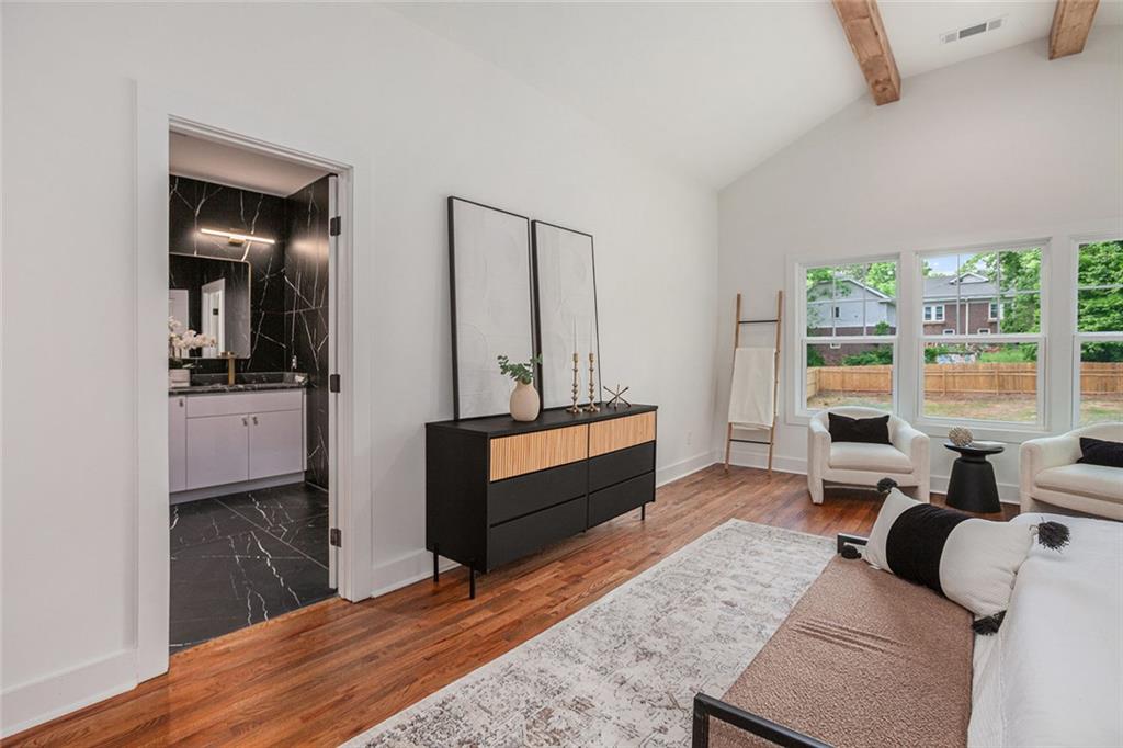 1721 South Gordon Street Southwest Atlanta, GA 30310 - Photo 24 of 44 a living room with furniture and a window