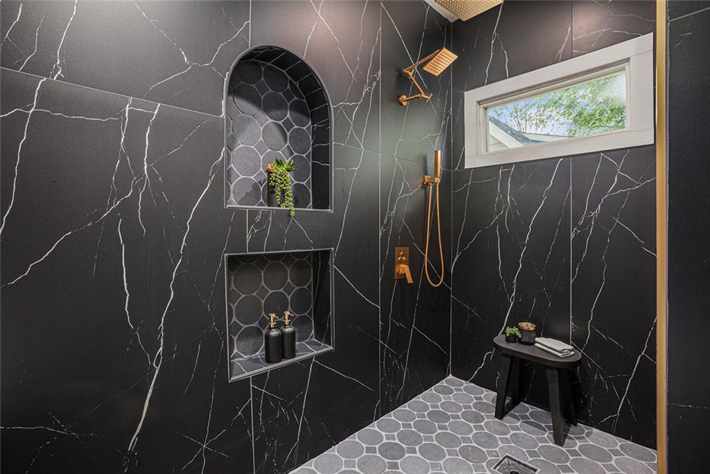 1721 South Gordon Street Southwest Atlanta, GA 30310 - Photo 32 of 44 a bathroom with a sink toilet and shower