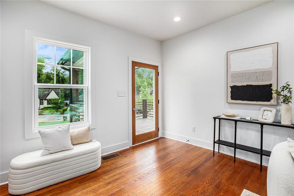 1721 South Gordon Street Southwest Atlanta, GA 30310 - Photo 6 of 44 a living room with furniture and a flat screen tv
