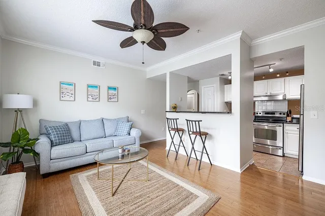a kitchen with granite countertop a stove and a sink