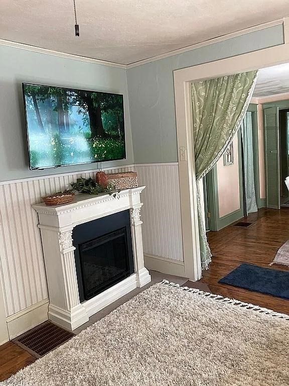 270 Wendell Depot Road Wendell, MA 01379 - Photo 15 of 42 a living room with a fireplace and a floor to ceiling window