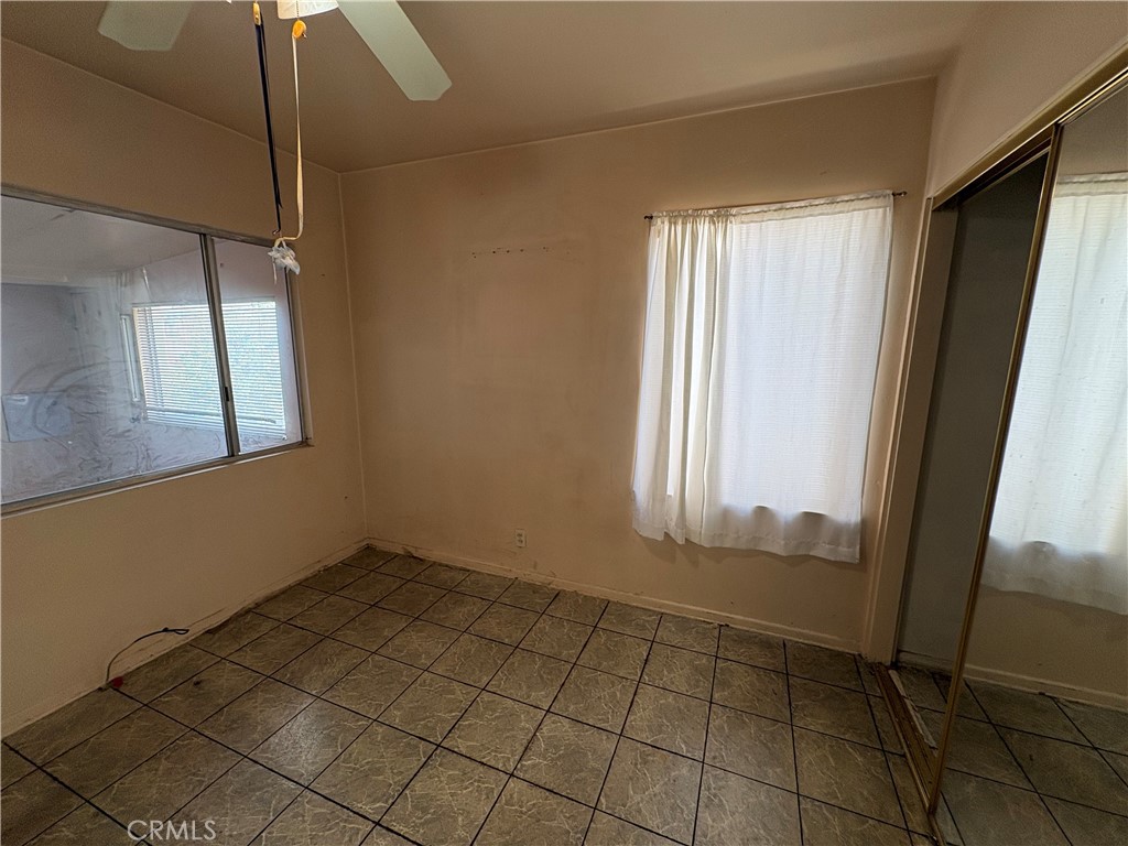 14023 Studebaker Road Norwalk, CA 90650 - Photo 17 of 33 a view of an empty room with a window