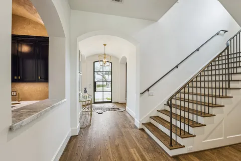 a view of entryway with wooden floor