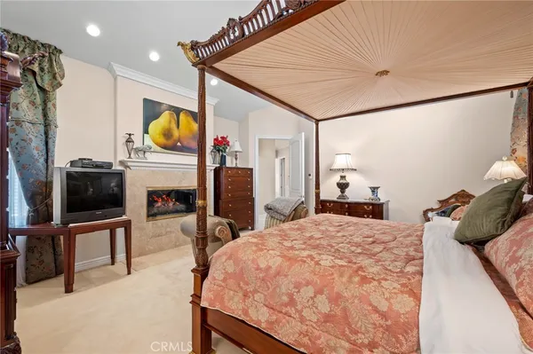 a spacious bathroom with a tub shower and sink
