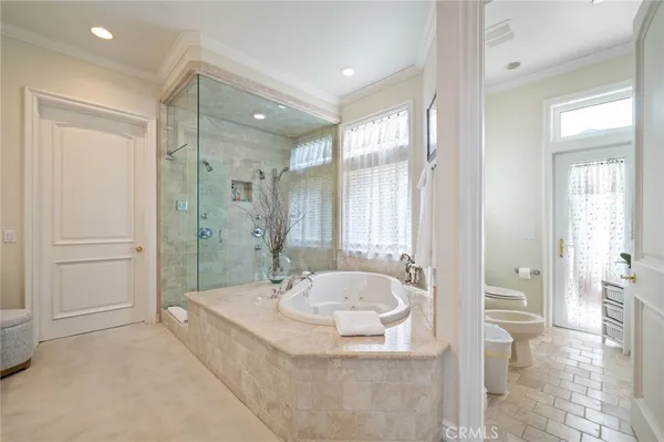 a kitchen with stainless steel appliances granite countertop counter space cabinets and refrigerator