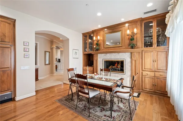 a kitchen with stainless steel appliances granite countertop sink stove and refrigerator