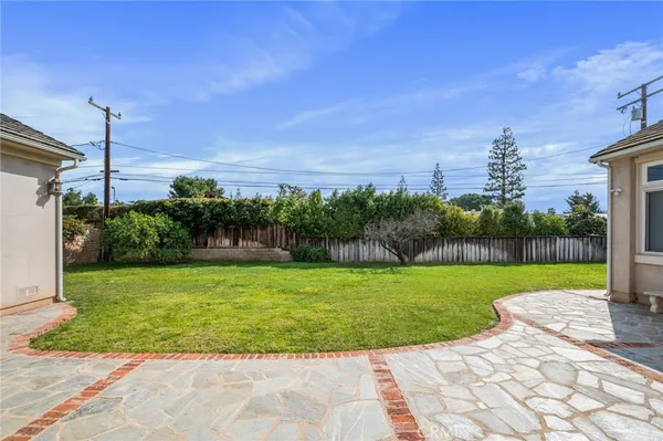 a view of a back yard of the house