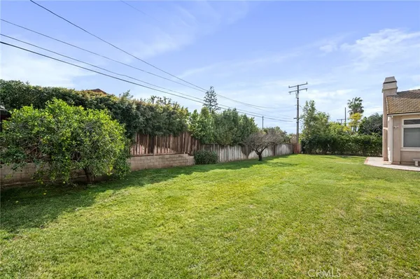 a view of a backyard with a small cabin