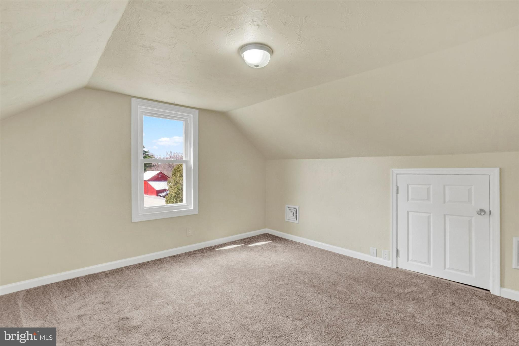 1050 Buck Road Dover, PA 17315 - Photo 18 of 28 an empty room with windows and wall painting