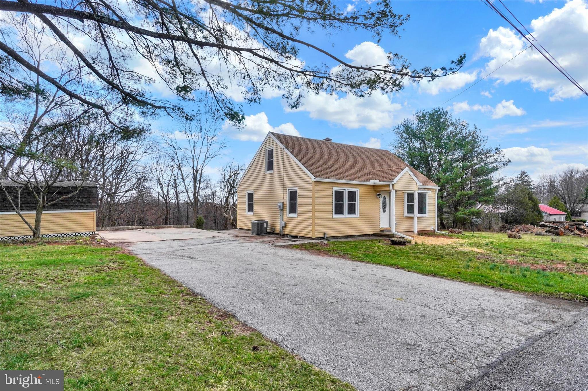1050 Buck Road Dover, PA 17315 - Photo 2 of 28 a view of a house with a yard and pathway