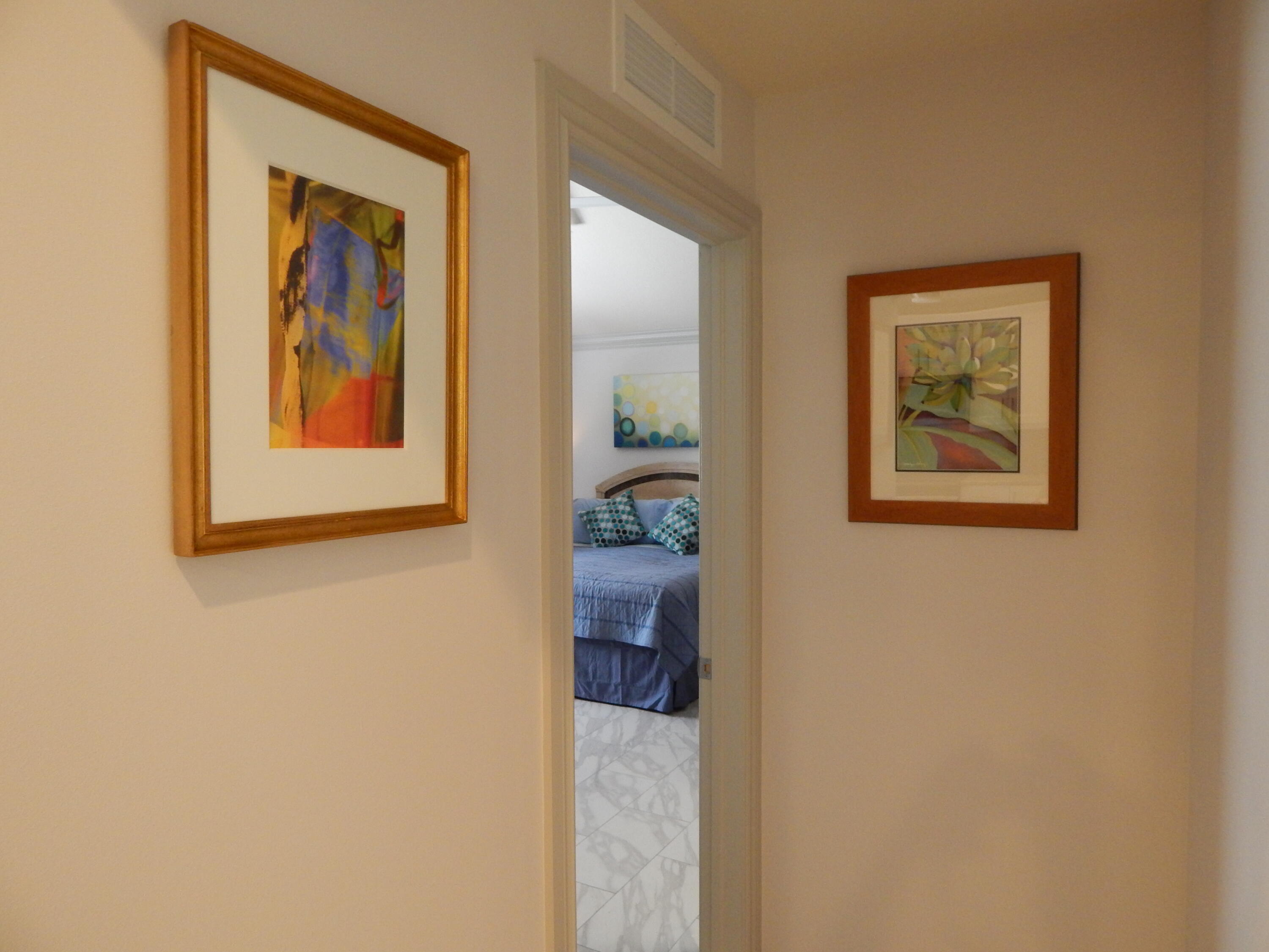 14790 Whatley Road Delray Beach, FL 33445 - Photo 11 of 37 Hallway to Primary Bedroom