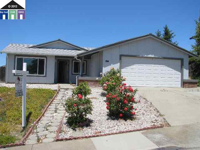 1057 Langlie Way Rodeo, CA 94572 - Photo 1 of 1 a front view of a house with garden