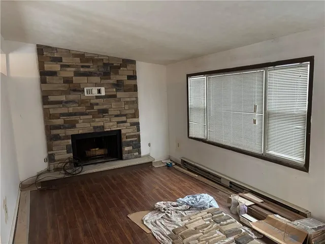 a living room with a fireplace