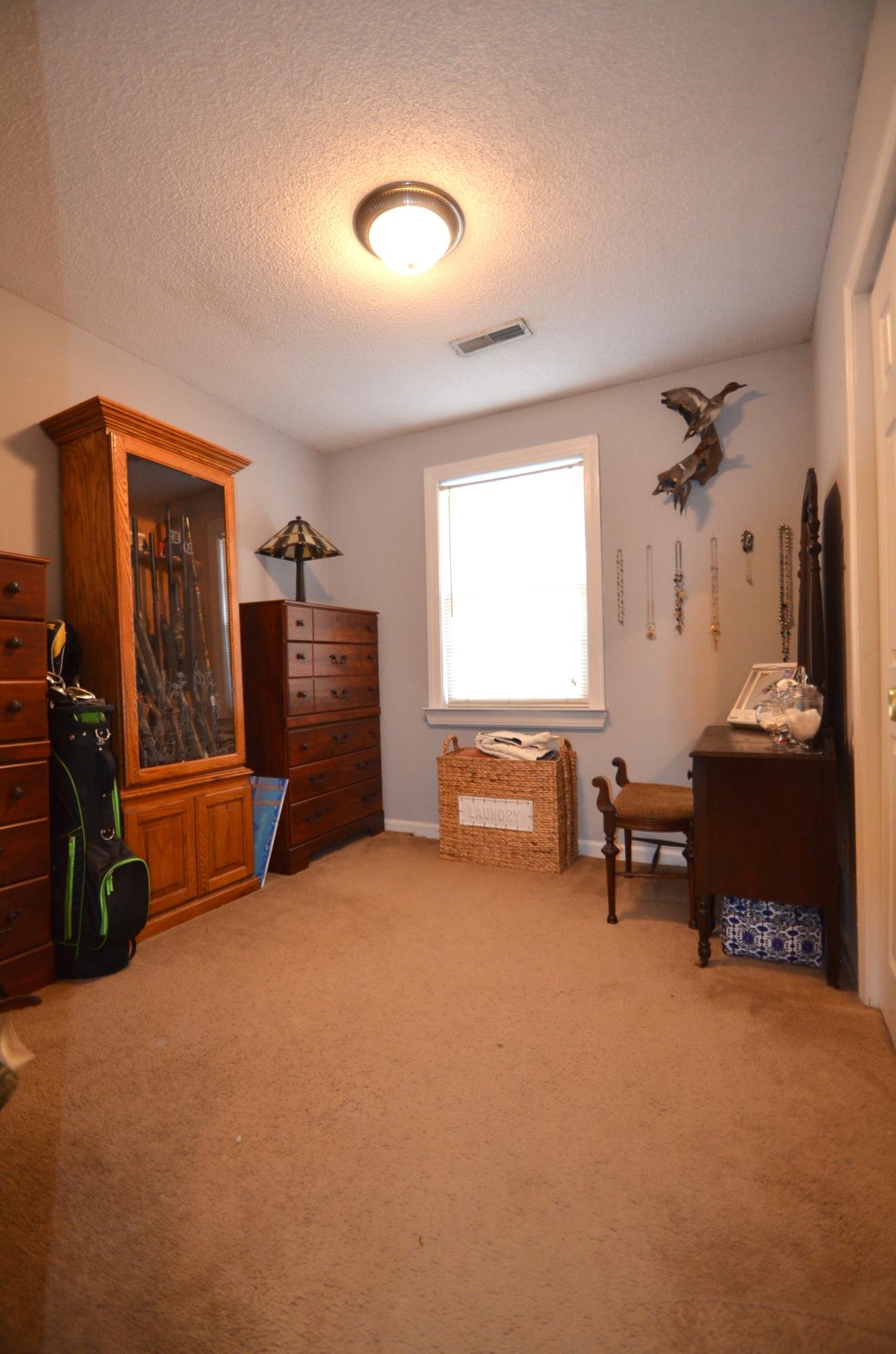211 Warren Street Moncks Corner, SC 29461 - Photo 11 of 14 Front left bedroom
