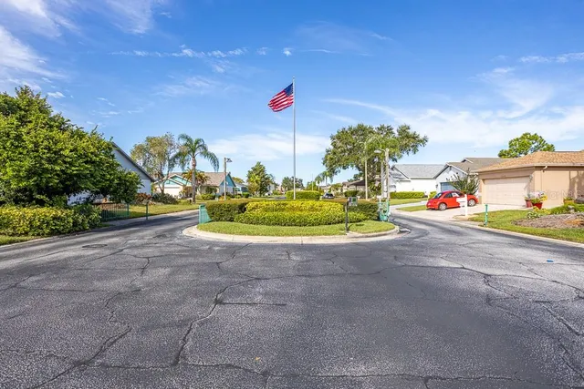 a swimming pool with outdoor seating and deck