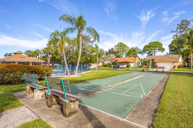a view of swimming pool with outdoor seating