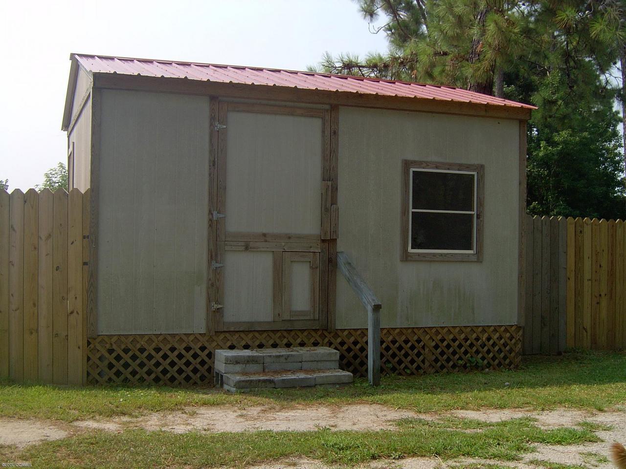 385 Firetower Road Beaufort, NC 28516 - Photo 8 of 11 Side View 16x12 Utility Building