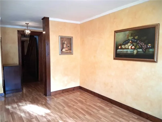 a view of a chairs and table in the patio