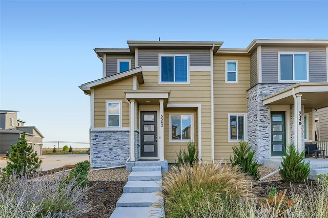 a front view of a house with a porch