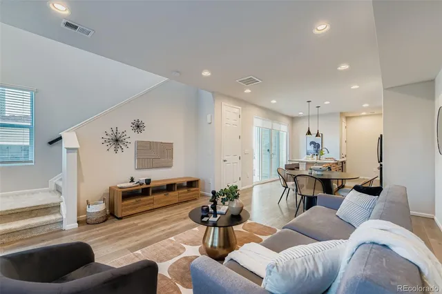 a living room with furniture and a couch