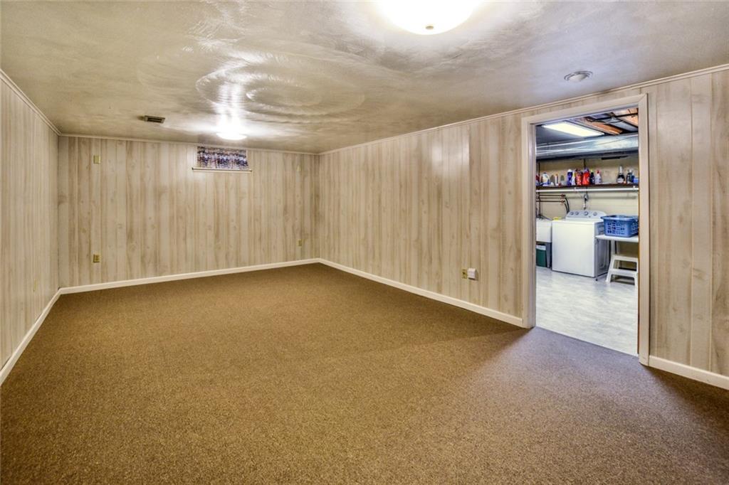 1289 Low Grade Road Harwick, PA 15049 - Photo 12 of 19 This LL game room has been recently refinished with new white paneling, a new plaster ceiling and new berber carpeting.