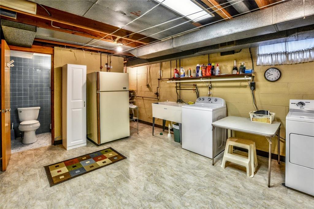 1289 Low Grade Road Harwick, PA 15049 - Photo 13 of 19 The clean spacious laundry area (which has a second refrigerator) features a full bath next to the LL game room which could double as guest quarters for those last minute holiday guests!
