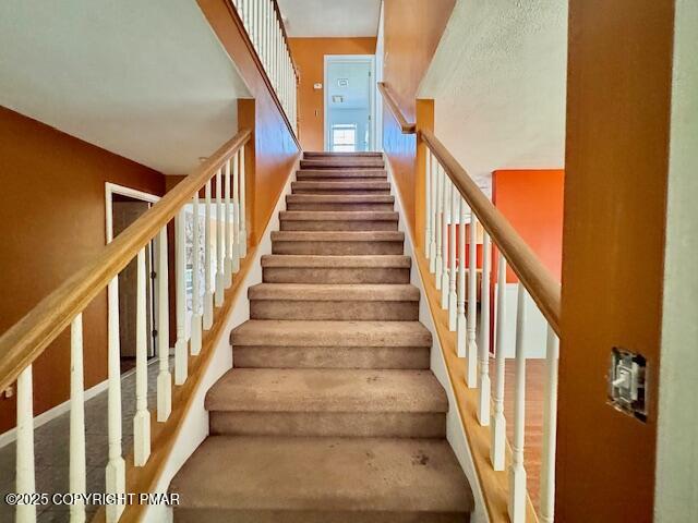 436 Cranberry Creek Road Cresco, PA 18326 - Photo 11 of 26 a view of staircase with wooden floor and white walls