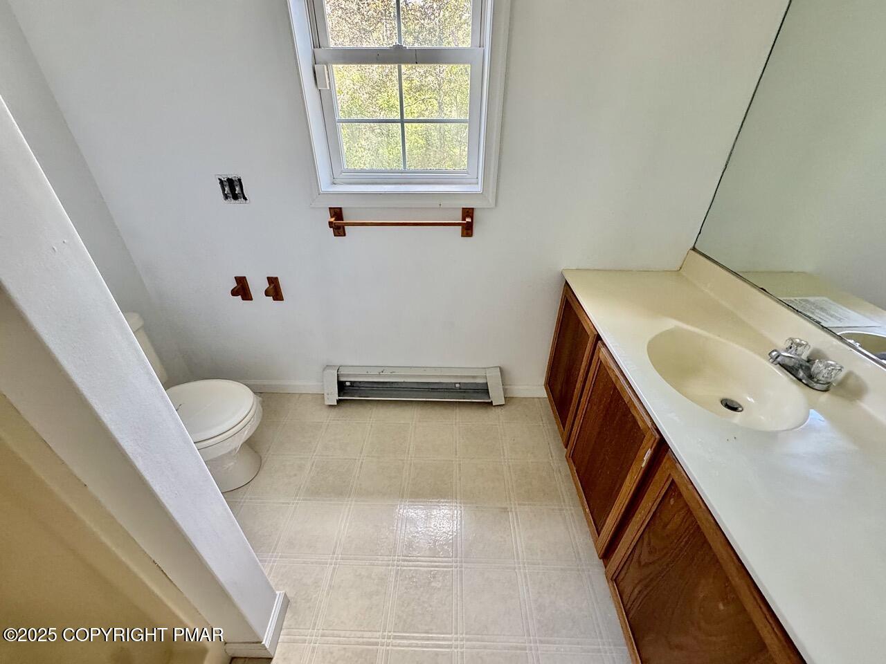 436 Cranberry Creek Road Cresco, PA 18326 - Photo 18 of 26 a bathroom with a sink and toilet