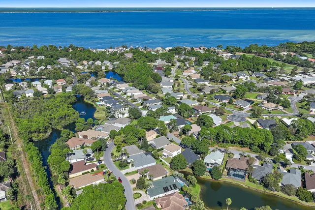 a view of a city with an ocean view