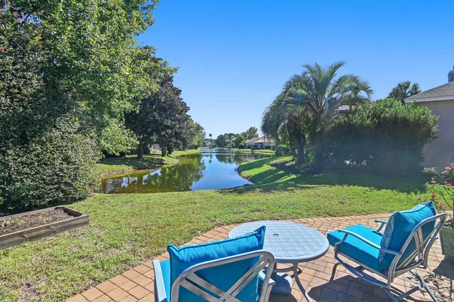 a view of yard with seating area and green space