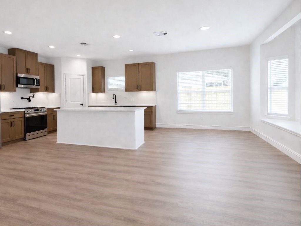 25696 John Wayne Drive Splendora, TX 77372 - Photo 2 of 6 a view of kitchen with wooden floor and electronic appliances