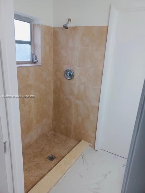 Kendall Green Pompano Beach, FL 33060 - Photo 4 of 8 a bathroom with a shower