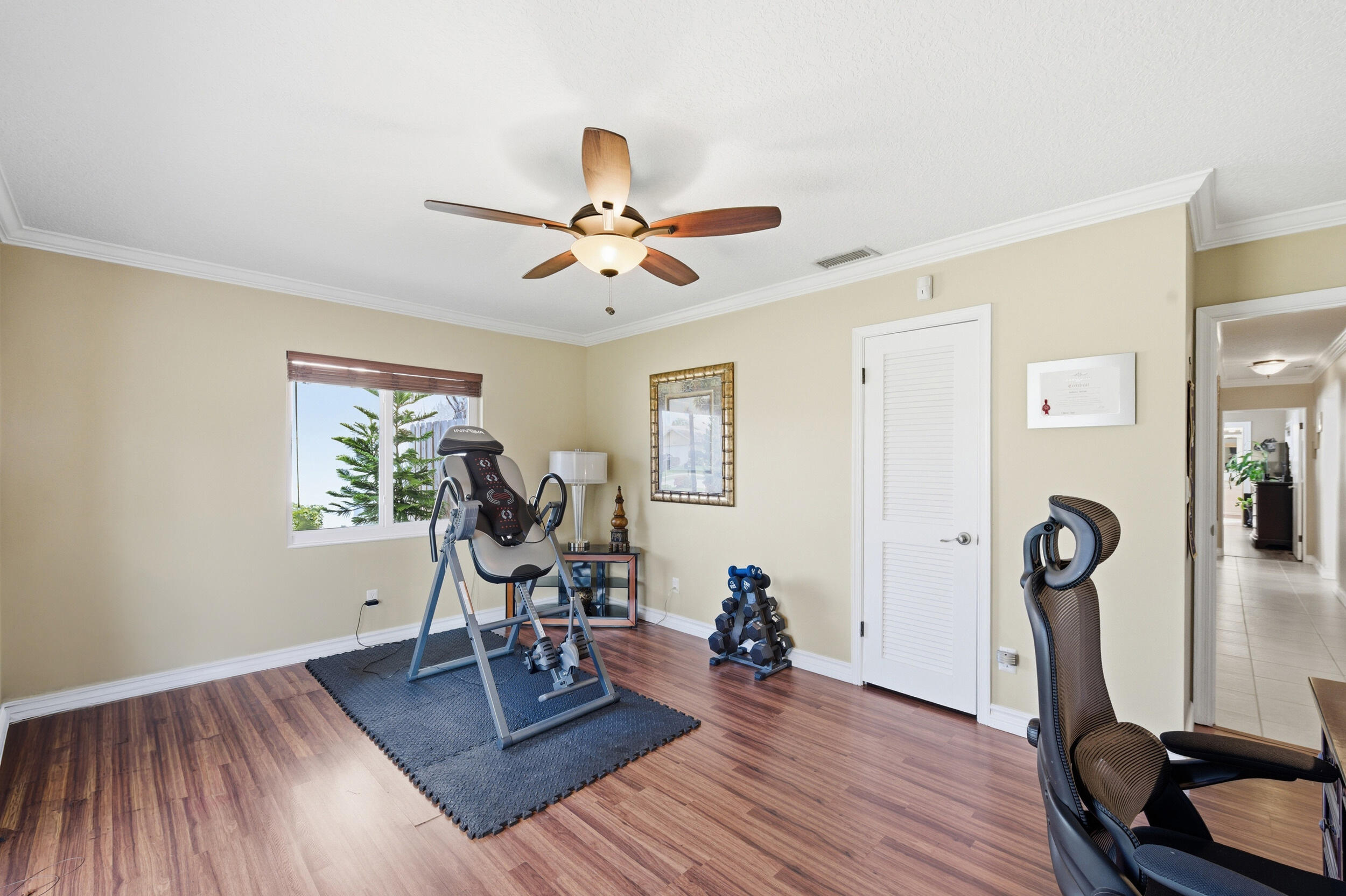 4780 Brandywine Drive Boca Raton, FL 33487 - Photo 25 of 43 a view of a room with gym equipment