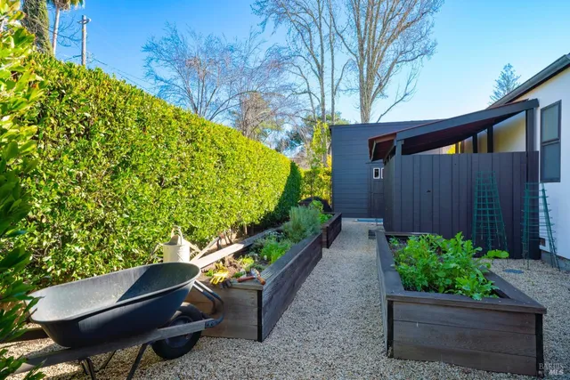 a backyard of a house with lots of green space