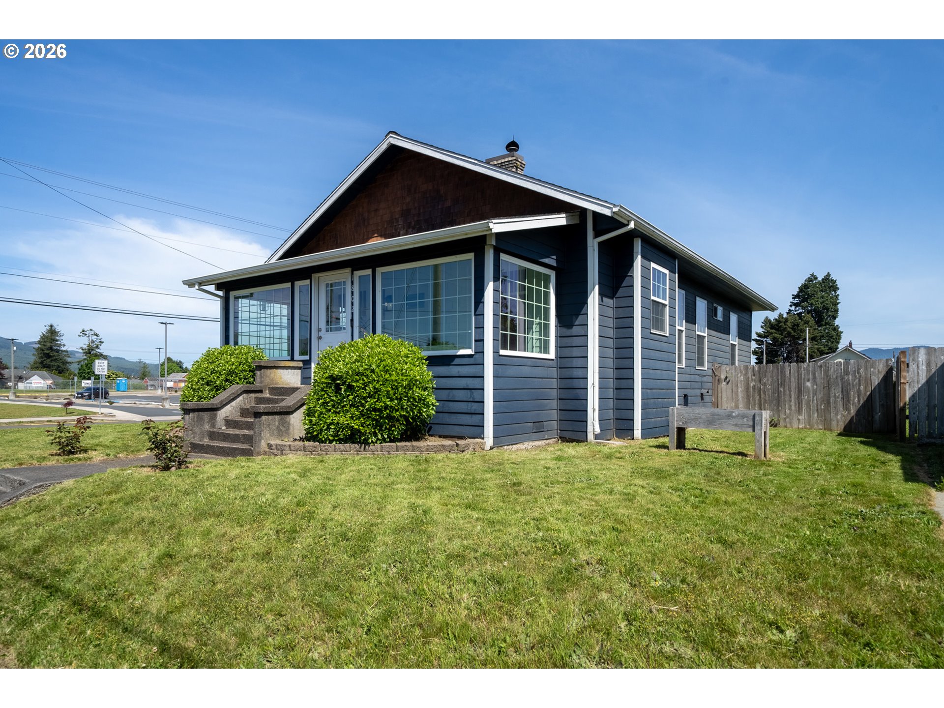 1802 8th Street Tillamook, OR 97141 - Photo 1 of 37 a view of front of house with a yard