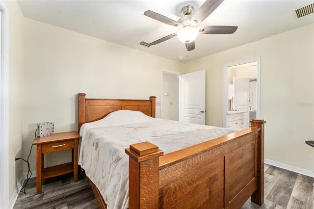 a kitchen with sink stove and cabinets
