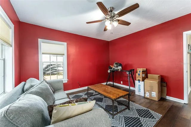 a view of a hallway with seating area