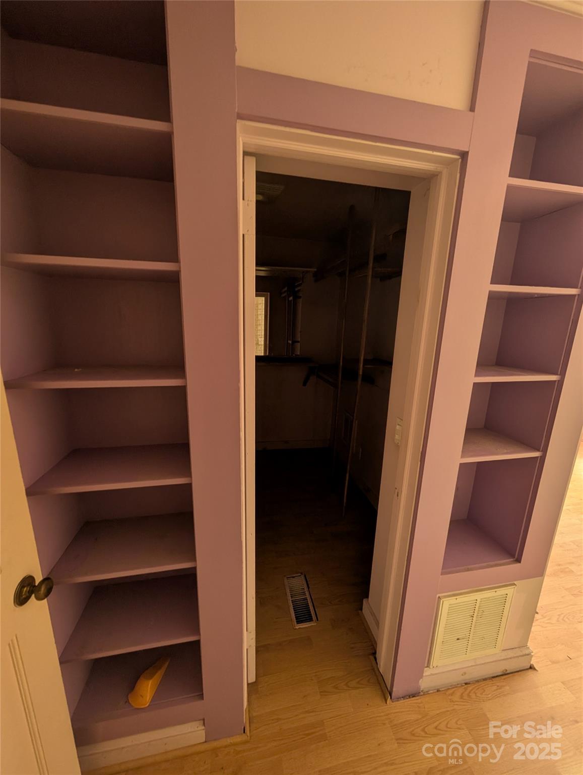 720 New Market Road Tryon, NC 28782 - Photo 11 of 15 a view of walk in closet with empty racks