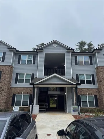 a car parked in front of a building