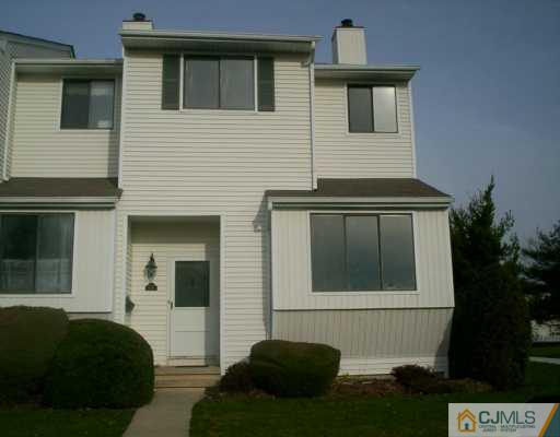 436 Middlewood Road Middletown, NJ 07748 - Photo 1 of 4 a front view of a house with a yard